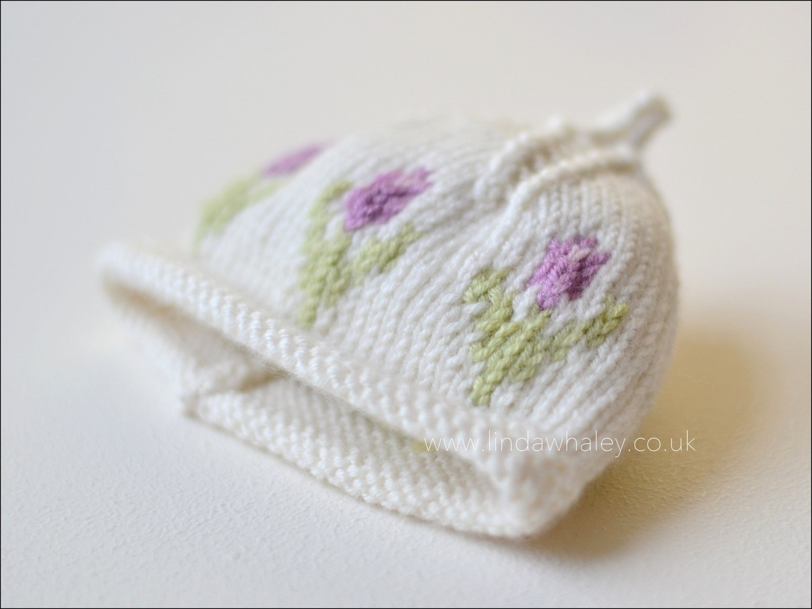 Baby flower 2024 hat knitting pattern